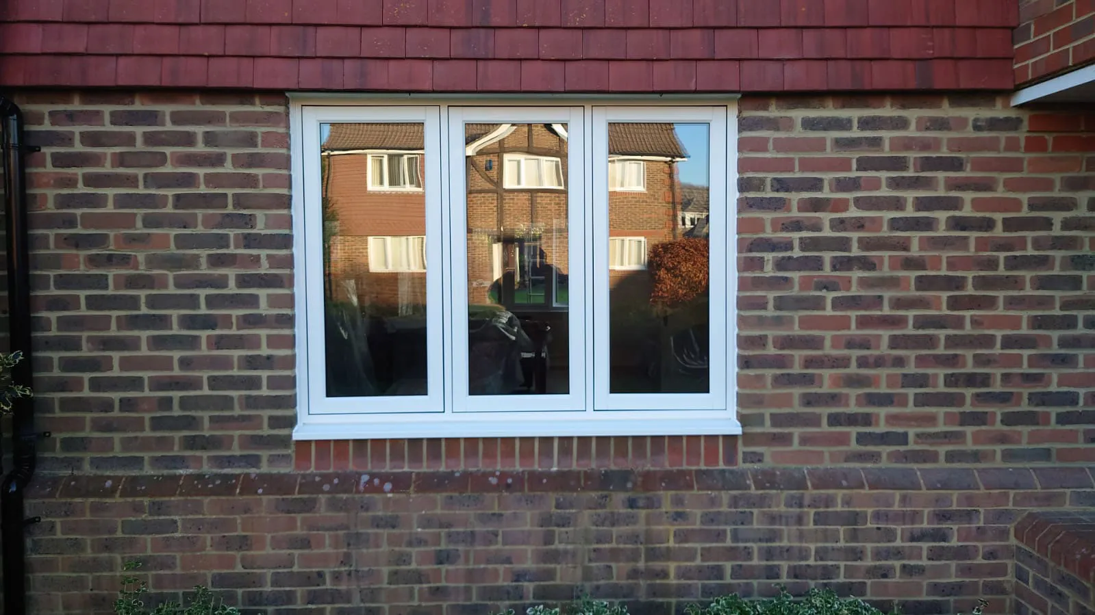 double glazing on blue house